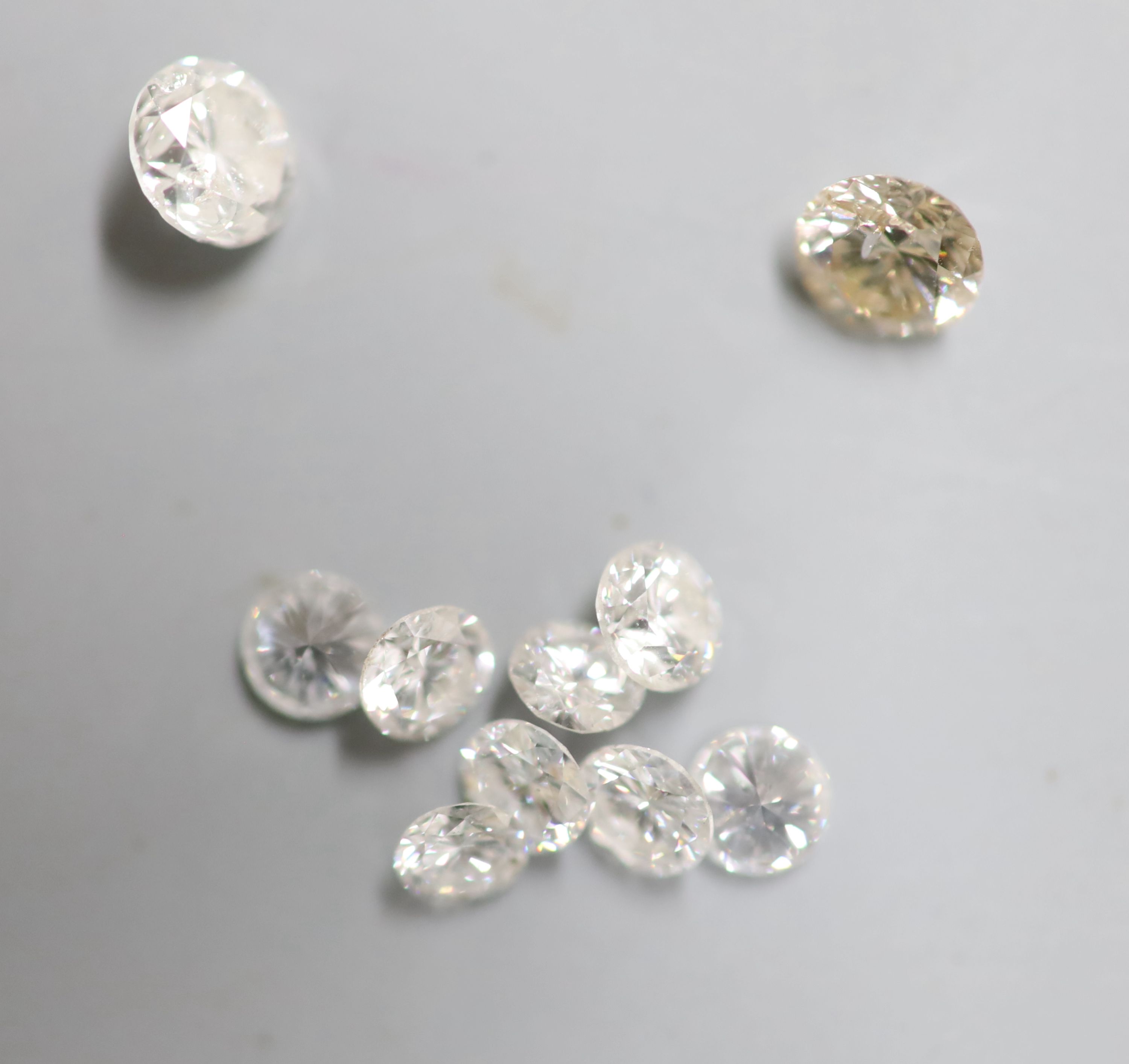 Two unmounted round cut diamonds, weighing 0.28ct and 0.35ct and eight other unmounted round cut diamonds.